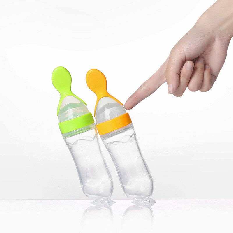 Squeeze spoon hot sale feeding bottle